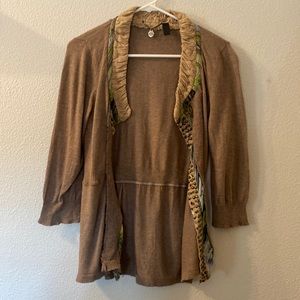 BKE Boutique fun print cardigan size is worn off but fits like a medium